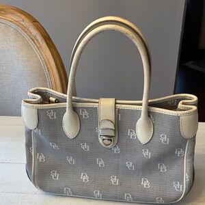 Dooney & Bourke handbag. Waxed Canvas with leather accents.